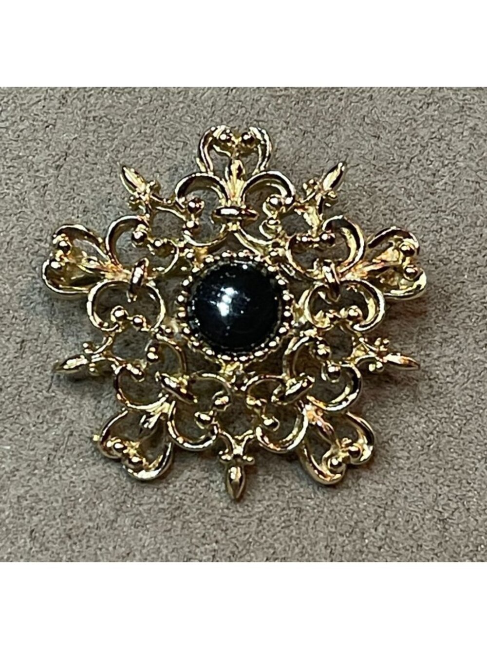 Vintage 80s 1928 Style Gold Filigree Fleur-de-Lis Brooch with Black Cabochon Cen